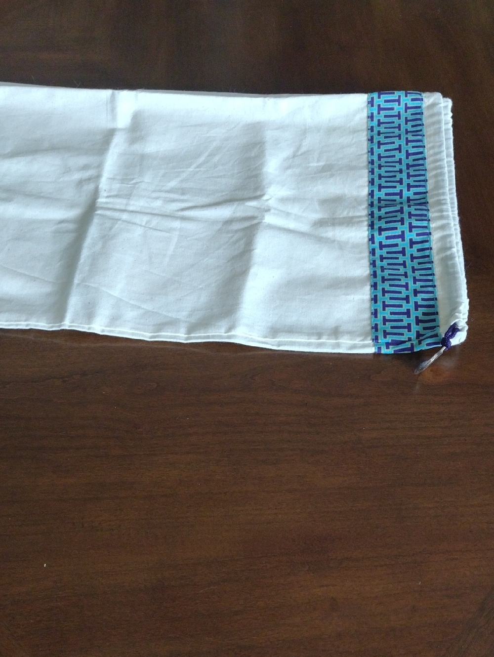 White Travel Drawstring Dust Bag with Blue Trim